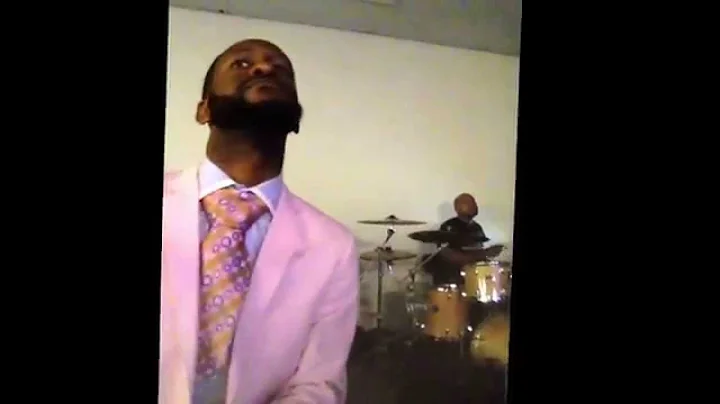 Pastor James Barnwell singing That's Love with the...