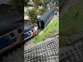 Passing the Invacar Indomitable pulling Network Southeast passenger train.