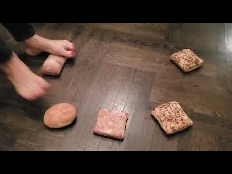 Soft Bread Crashed by Bare Feet.