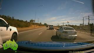 BAD Driving Australia - Speeding mazda makes another lane on Perth freeway!