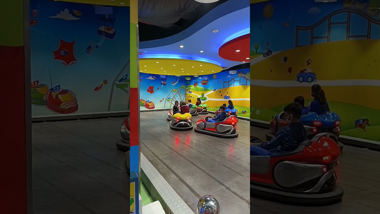 Bumper Car enjoingAmbience Mall Gurgaon Atharv & Mamma enjoying