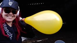 Semi Popper Looner Blowing Yellow Balloon Outside Under Bridge Inflation Deflation Redhead Clown