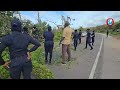Police clear fallen trees in Trelawny after Hurricane Melissa