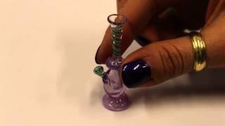 Mini blown glass pipe in action