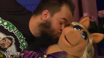 Miss Piggy gets a kiss from Hornswoggle