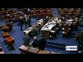 Mitch McConnell is seen on Senate floor shaking hands