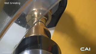 Single side (D-type) lens centering in wet and dry grinding