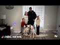 Firefighter who saved puppies in house fire adopts them