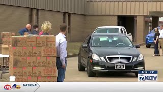 Goudarzi and Young continue holiday ham giveaway at Gilmer Elementary