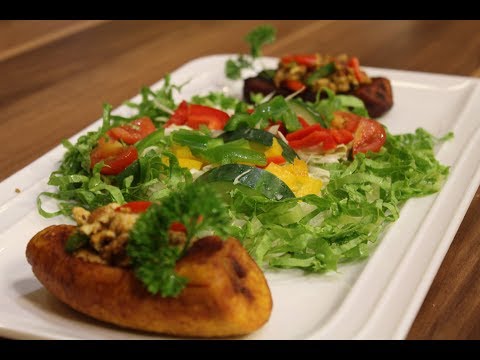 Mouthwatering Egg-Stuffed Plantain Boat With Veggie Salad