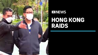 More than 50 Hong Kong activists arrested under national security law | ABC News
