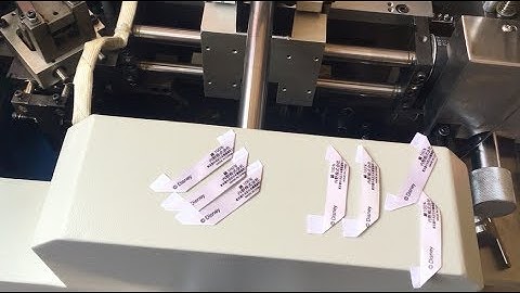 YS-4000 wide printed garment label cut and mitre fold setup - step 1