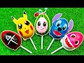 Some lots of big lollipops  satisfying yummy candies baby shark squid game pikachu stitch