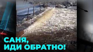 Последствия паводка: вода размыла часть дамбы и затопила автомобильную дорогу