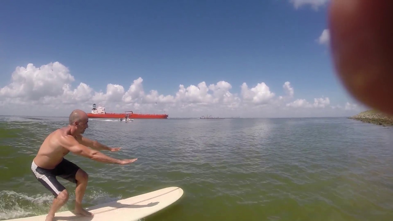 Tanker Surfing Galveston with Dolphins!
