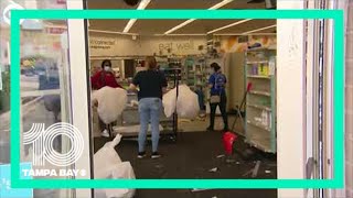 Chicago businesses clean up after overnight damage and looting