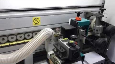 Auto edge bander with side boring function