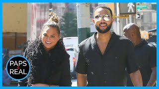 John Legend \& Chrissy Teigen smiling amid Social Media Controversy