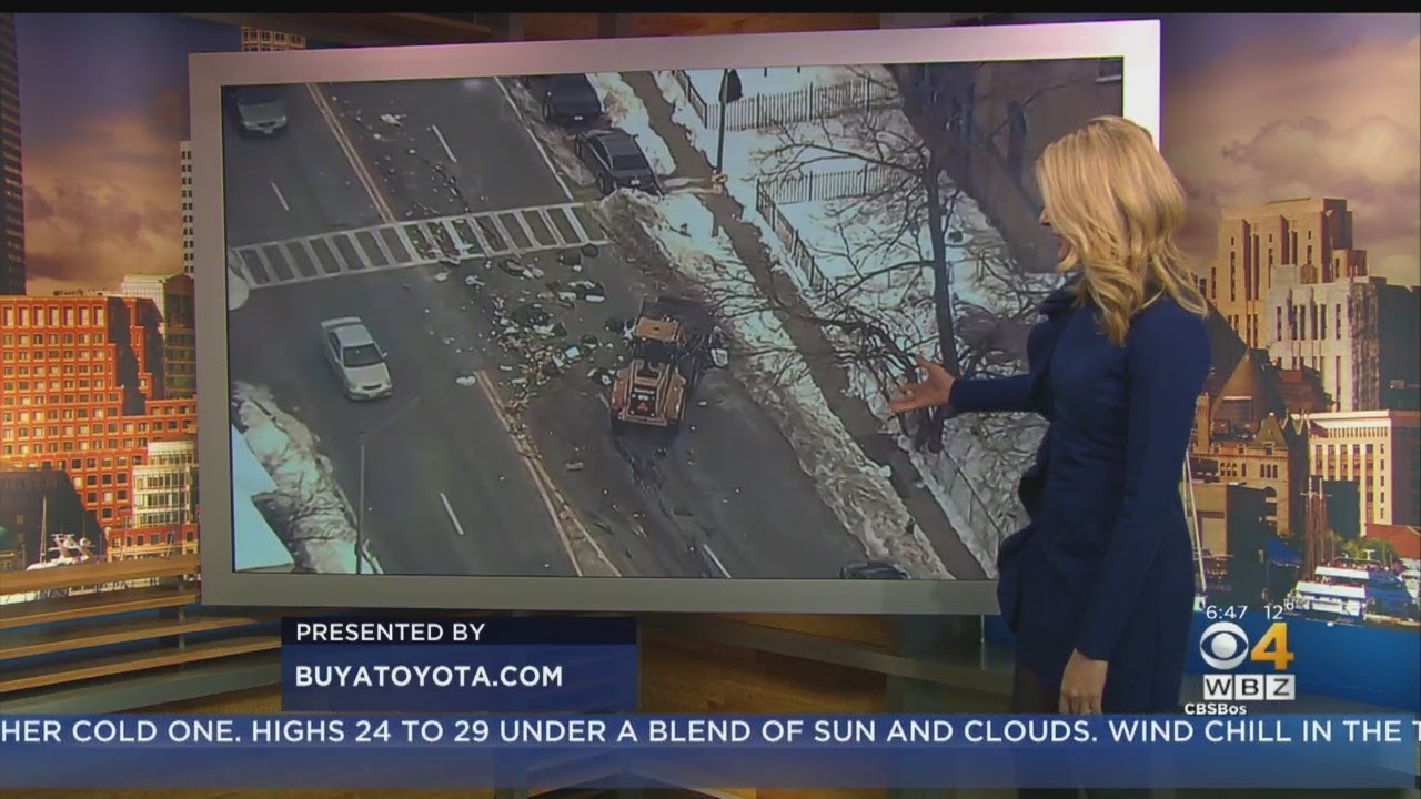 Trash Truck Spills Garbage Over Dorchester Street At Start Of Rush Hour
