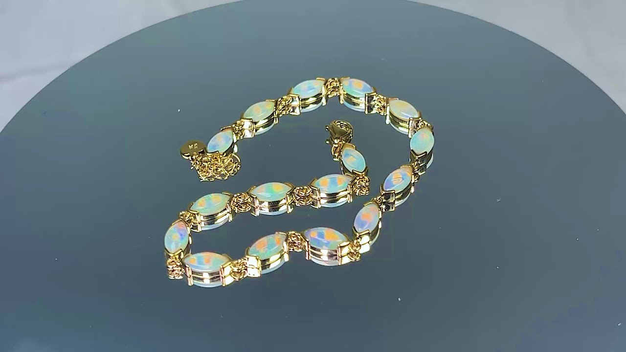 9kt Yellow Gold Marquise shape V claw Light Opal bracelet 21.5cm