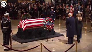 Video Extra: Trump salutes Bush casket