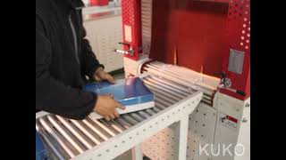 KUKO Continuous Motion Automatic Sealer Shrink Wrapper for books.