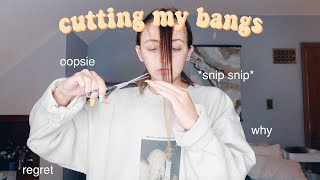 having a breakdown and cutting my own bangs