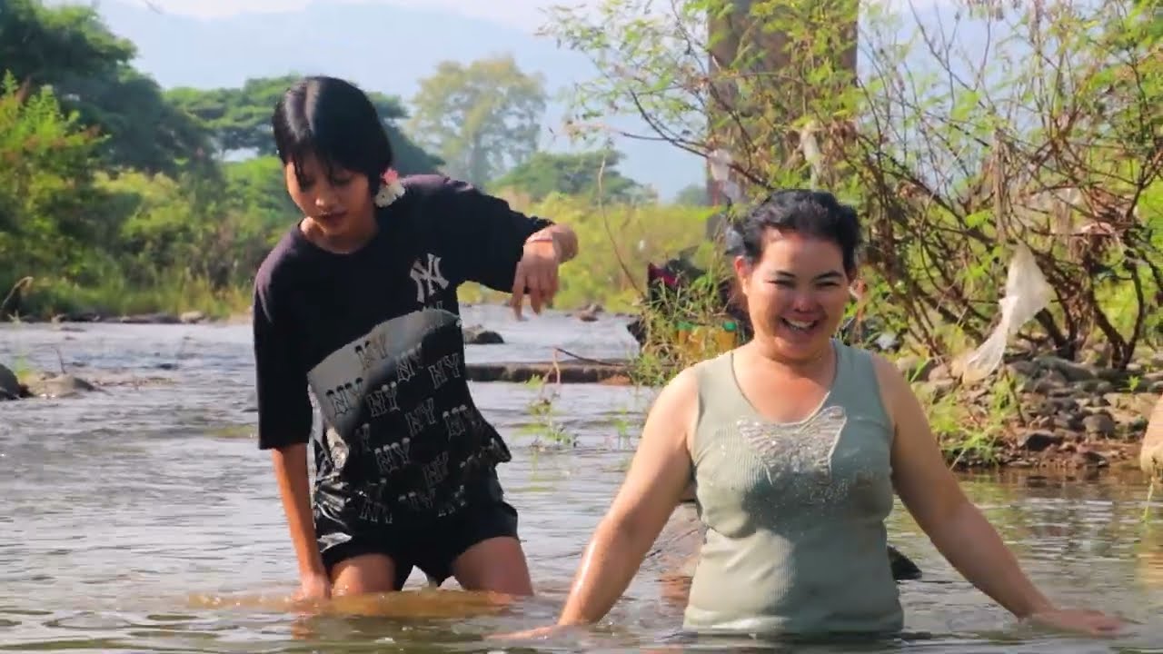 fishing tool traditional name Lay-Girl fishing in river