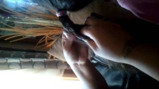 Sharizt doing a fishtail braid