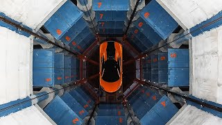 Watch cars being elevated through an automated parking lot in Hangzhou