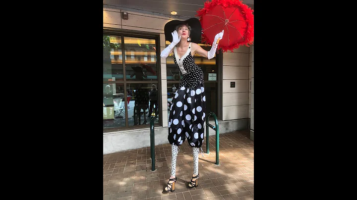 High Fashion stilt-dancer!