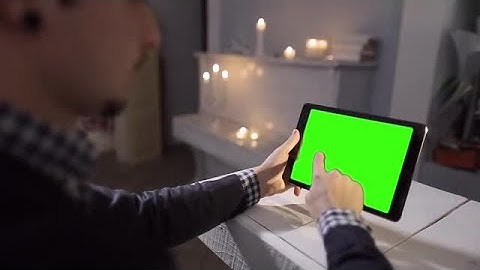 Man Using Tablet In Cafe Stock Video