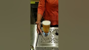 Beer glass fills from bottom