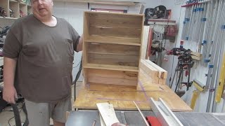 Using pallets to make a kitchen cuberd.