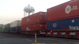 UP 8592 leads EB stacktrain out of Global 3