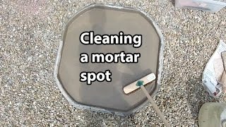 Cleaning a cement mortar mixing spot