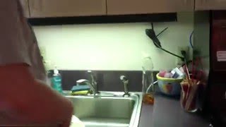 Classic Sink Spray April Fools Prank on Unsuspecting Coworker