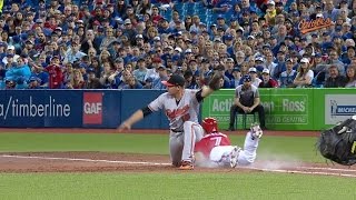 BAL@TOR: Bundy charges off mound to retire Coghlan