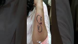 infinity tattoo with birds and name with love ❤️