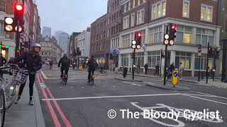 Two Cyclist Jumping Red Lights.
