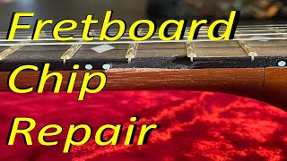 Fretboard Chip Repaired