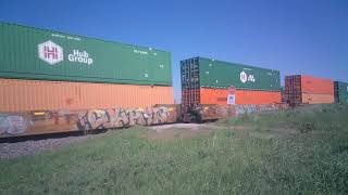 Southbound Union Pacific stack train kicking up ballast on the Spine Line