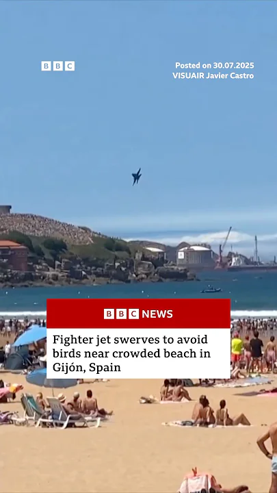 Fighter jet swerves to avoid birds near crowded beach in Gijón, Spain. #Spain #BBCNews