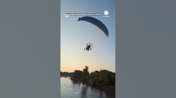 Paraglider Hits Power Lines, Crashes Into River