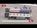 Casket carrying us senior airman roger fortsons body removed from plane at atlanta airport