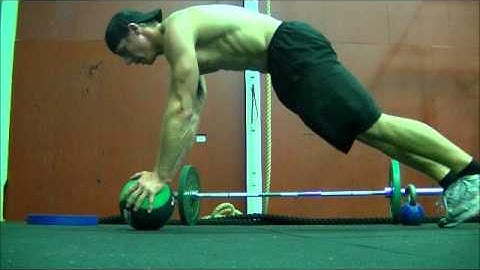 Rolling medicine ball push up