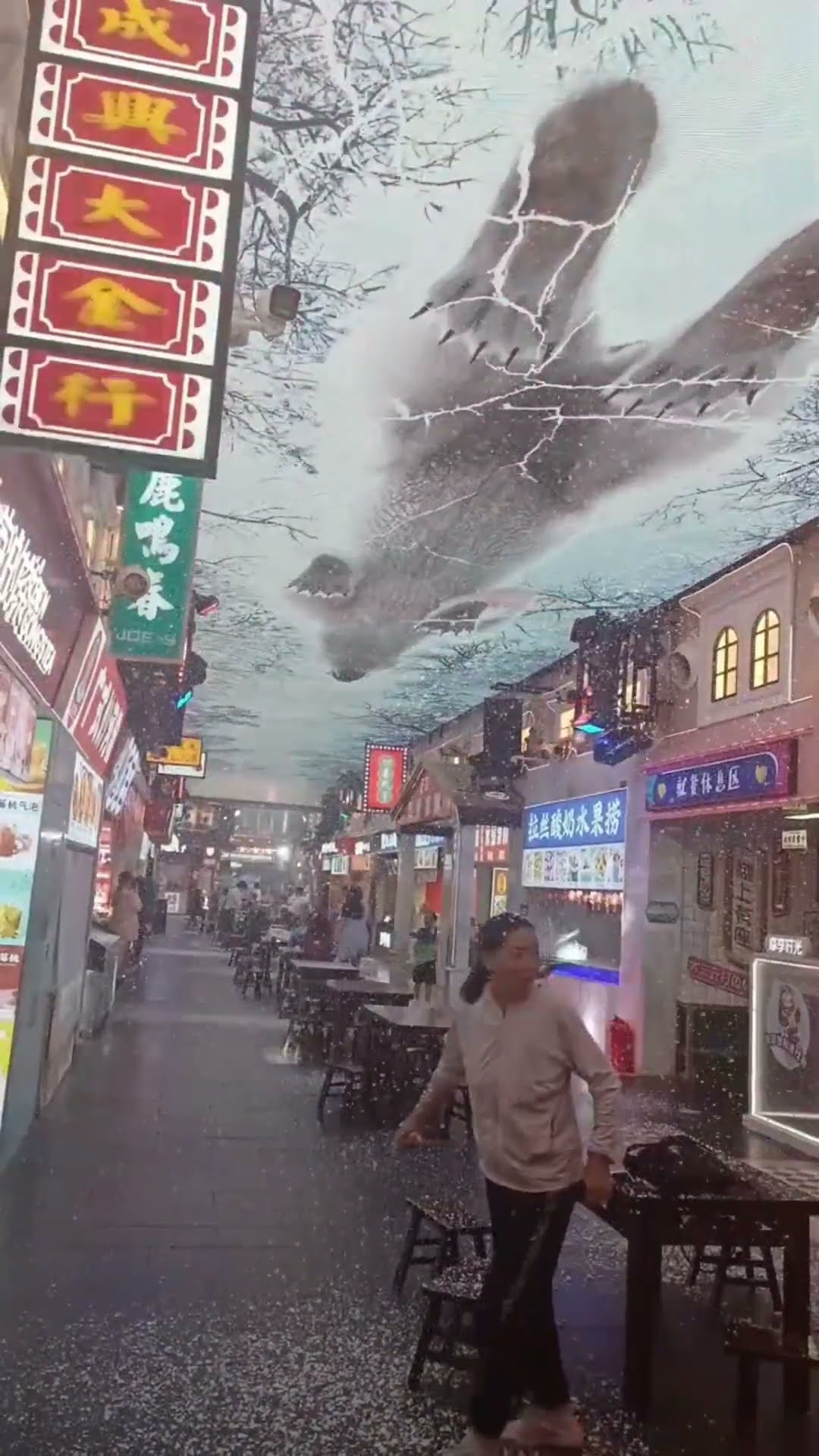 Ceiling Bear Illusion and Simulated Snowfall Inside a Food Market