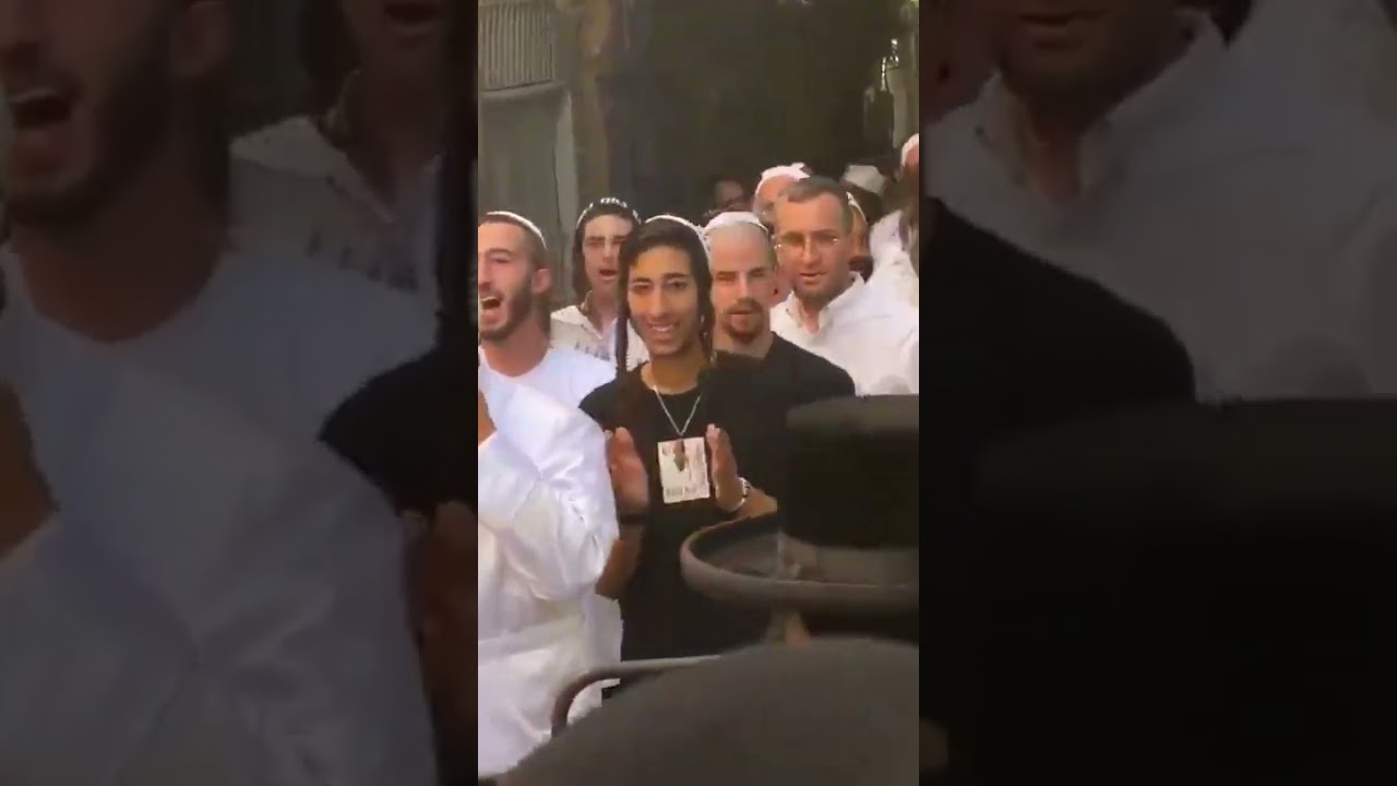 Footage of Israeli settlers dancing in Jerusalem, provoking the Palestinians. 