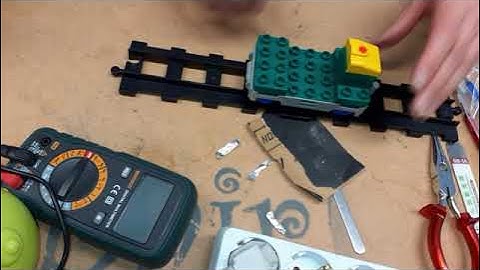 Opening a 30+ year old DUPLO electric train for repair.