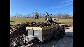 Hauling dirt with the new Cam dump trailer